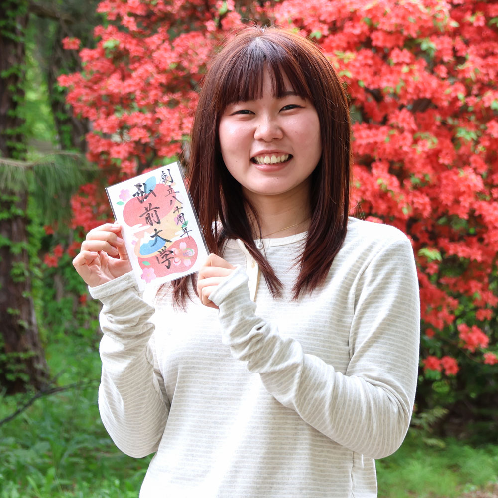 記念符デザイン担当　小森香好さん（地域共創科学研究科）